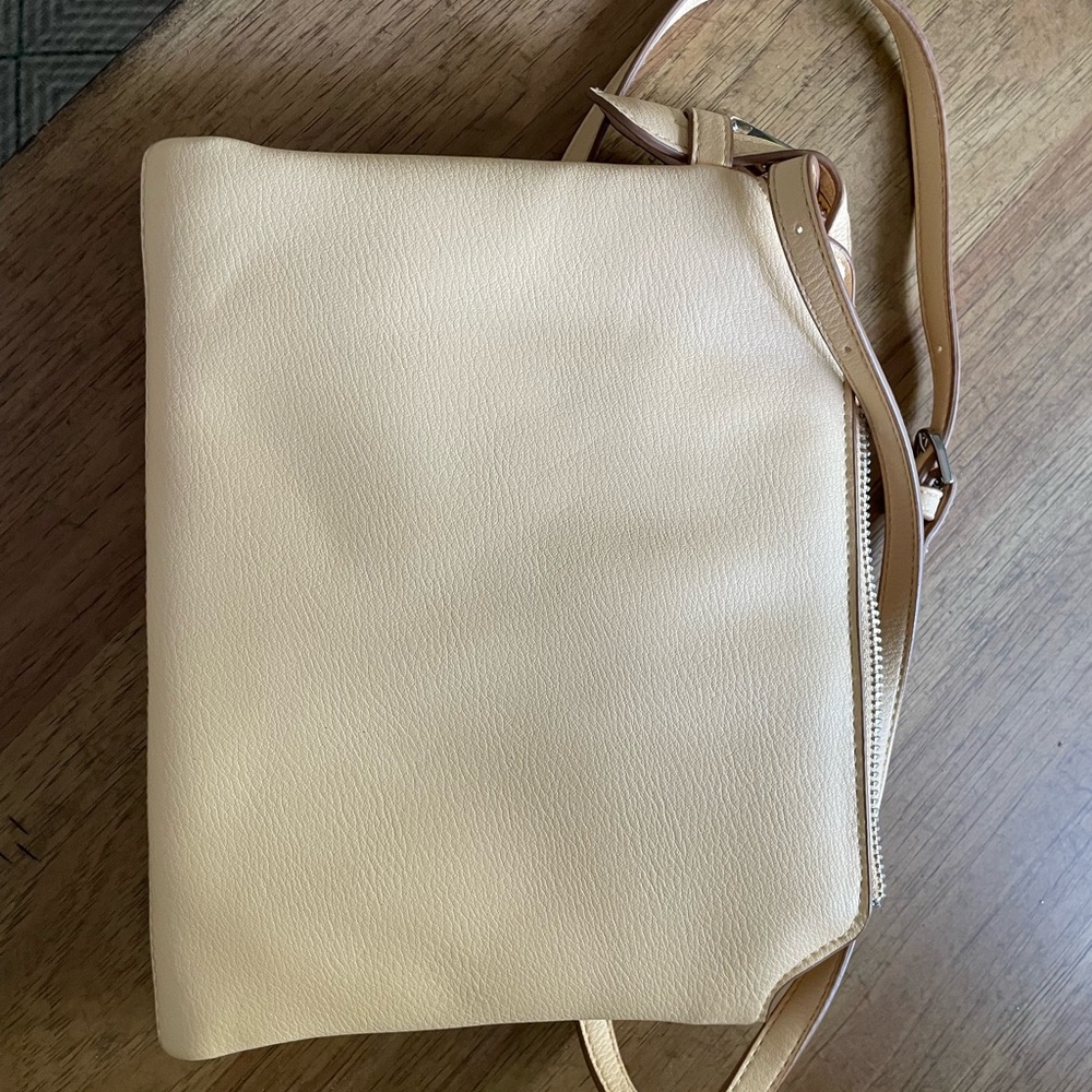 A new day 
Cream Crossbody Bag